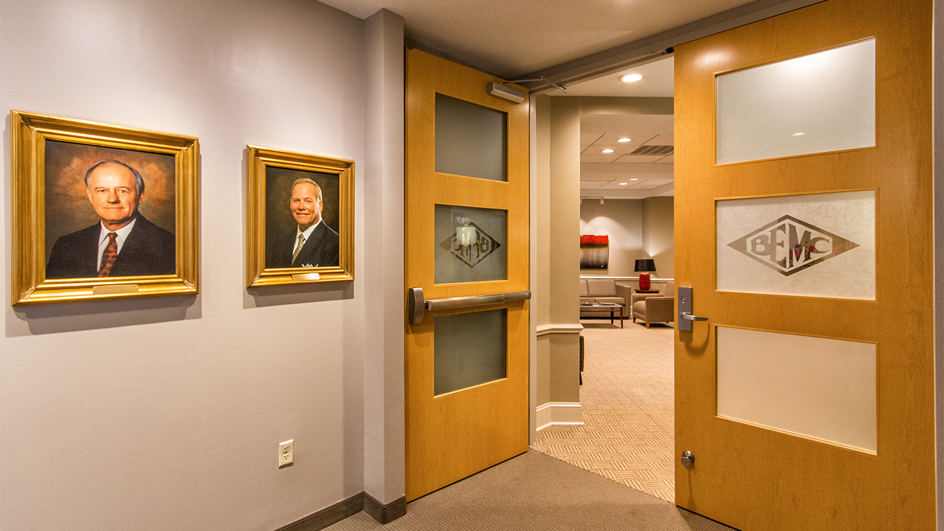 Large doors lead from a hallway into the main entrance area of the BEMC Main Headquarters